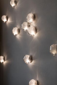 a wall with many lights attached to it