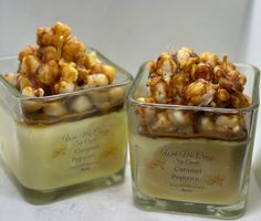 two small glass containers filled with caramel popcorn