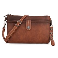 Made of PU leather, this crossbody has: An open pocket with magnetic button closure on the front Top zipper closure Inside of the bag includes a zippered pocket and 2 card slots A zippered pocket on the back Single removable strap to convert clutch to wristlet Detachable and adjustable crossbody strap included 8.2" (W) x 0.5" (D) x 5.2'' (H) Classic Crossbody Bag, Bag Collection, Crossbody Clutch, Aztec Pattern, Navy And Green, Crossbody Strap, Black And Navy, Purses Crossbody, Card Slots