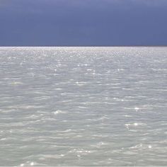 the water is crystal clear and blue