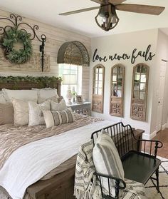 a large bed sitting in a bedroom on top of a hard wood floor