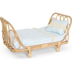 a bed made out of bamboo with white sheets and pillows on the bottom, in front of a white background