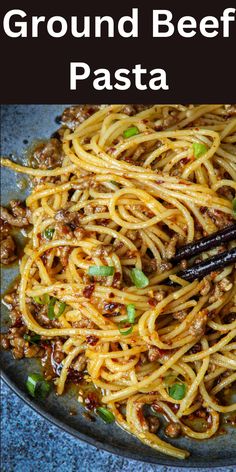 a plate full of ground beef pasta with chopsticks in it and text overlay that reads ground beef pasta pasta