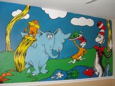 the dr seuss mural is painted on the wall in this children's room