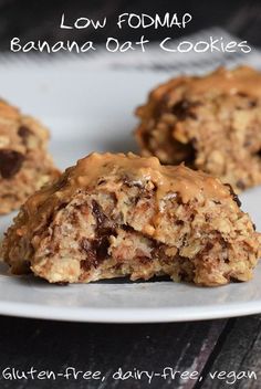 three banana oat cookies on a white plate