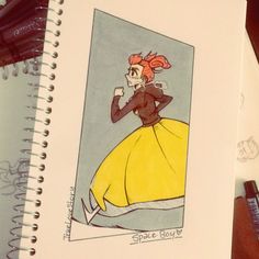 a spiral notebook with a drawing of a woman in a yellow dress on the cover