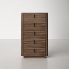 a wooden dresser sitting on top of a white floor