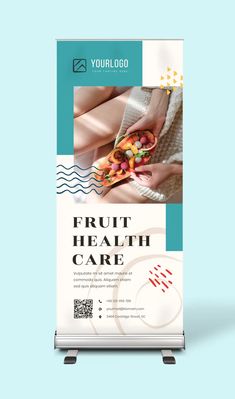 a roll up banner with the words fruit health care on it and an image of hands holding