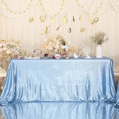 there is a blue table cloth on the table