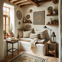 a living room filled with lots of furniture and decor on top of a floor next to a window