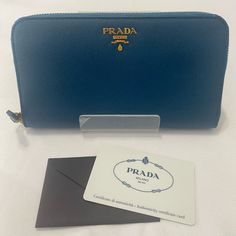 Prada Saffiano Metal Gold Colbalto Wallet Luxury Blue Wallet For Formal Occasions, Designer Blue Wallet For Formal Occasions, Designer Blue Wallets For Formal Occasion, Elegant Blue Wallet With Rfid Blocking, Elegant Blue Wallets With Rfid Blocking, Designer Blue Wallets For Business, Designer Blue Business Wallets, Elegant Blue Rfid Blocking Wallets, Luxury Blue Wallet With Rfid Blocking