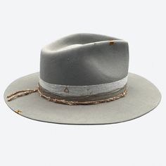 A classic felt fedora hat in light grey with rose gold details. Pair this beauty with any summer outfit to give that extra special touch to your look. White linen & vintage silk ribbons Silk thread with 18k rose gold tubular beads 18k rose gold plated over sterling silver Wavy disc 24k gold plated crimp beads 18k rose gold faceted beads 18k gold over sterling silver Triangle charm 100% silk interior lining 100% fur felt Sweatband with ‘more self love’ inspirational quote All hats are unique and Luxury Adjustable Felt Hat With Curved Brim, Luxury Adjustable Curved Brim Felt Hat, Luxury Felt Hat For Kentucky Derby, Luxury Adjustable Fedora Felt Hat, Luxury Adjustable Felt Fedora Hat, Luxury Felt Hat With Adjustable Flat Crown, Adjustable Luxury Hat Bands For Formal Occasions, Luxury Adjustable Fur Felt Hat Band, Luxury Adjustable Felt Hat With Flat Crown