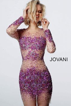 Jovani 47598 is a sheer beaded & Crystal Rhinestone Embellished short fitted cocktail dress. Featuring long sleeves & a high neckline short Formal evening gown is perfect for Prom, Pageant, homecoming & More! Available Colors: Fuchsia/Nude, Teal/Nude Available Sizes: 00-24 Cocktail Dress Long Sleeve, Cocktail Dress Long, Sheer Long Sleeve Dress, Embellished Cocktail Dress, Embellished Shorts, Long Cocktail Dress, Long Sleeve Cocktail Dress, Short Prom Dress, Short Cocktail Dress