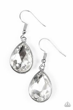 An oversized white rhinestone teardrop drips from the ear in a timeless fashion. Earring attaches to a standard fishhook fitting. Sold as one pair of earrings. P5RE-WTXX-269XX Bridal Jewellry, Paparazzi Earrings, White Hoop Earrings, Round Diamond Earrings, The Fame, Mobile Boutique, Jewel Wedding, Black Gems, The Ear