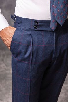 Make a lasting impression in our blue and red Prince of Wales suit from our Soragna Capsule Collection. The matching trousers come in a slim fit cut and are equipped with an extended fastening belt in order to ensure your fit is comfortable. #sartorial #tailored #sartorialist #styleforum #bespoketailoring #tailoring #pittiuomo #savilerow #bespoketailor #sprezzatura #dandy #bespoke #suitup #mnswr #suitandtie #bespokestyle #gq #bespokeshirts #tailoredsuits #bespokesuits #menwithclass #gentleman Prince Of Wales Suit, Glen Plaid