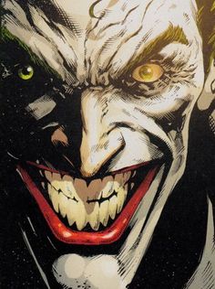 a close up of a joker face with yellow eyes