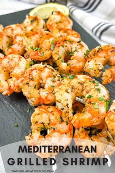 Shrimp skewers on a white plate with lemon wedges. Mediterranean Grilled Shrimp, Mediterranean Shrimp Recipe, Mediterranean Recipes Healthy, Mediterranean Diet Recipes Dinners, Flavorful Shrimp, Marinated Shrimp, Greek Salad Recipes, Shrimp Recipes For Dinner