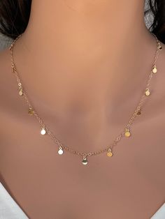 14k gold fill tiny disc necklace. Perfect looking on its own or layering with other dainty necklaces. It makes of.. -4.5mm 14k gold fill 14-22 coils attach -14k gold fill cable bigger chain, -Come up with beautiful ribbon gift box that enhance your present ... It could be Rose gold fill . GOLD COINS https://www.etsy.com/listing/258733697/gold-coin-necklace-sterling-silver-coin?ref=shop_home_active_3&ga_search_query=gold%2Bcoin LAYERED NECKLACES https://www.etsy.com/shop/rainbowearring?sectio Delicate 14k Gold-filled Dangle Charm Necklaces, Delicate 14k Gold-filled Dangle Charm Necklace, Minimalist 14k Gold Filled Dangle Charm Necklace, Dainty 14k Gold Necklace With Dangling Charms, Dainty 14k Gold Filled Coin Necklace, Mimi Ikonn, Cougar Town, Courtney Cox, Luxy Hair