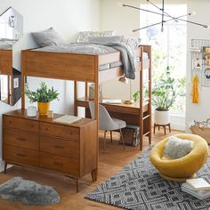 a bedroom with bunk beds, dressers and other furniture in the room that is well lit