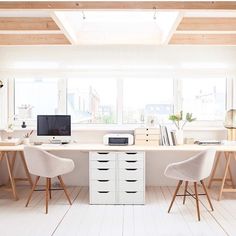 the home office kit includes two desks and chairs