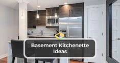 an apartment kitchenette with wooden floors and black bar stools in front of the counter