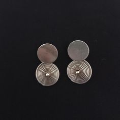 Hand made in Europe. 925 silver earrings. Old and wonderful. Spiral. You start at the middle bead with one wire and go around. In good condition. *weight: 10 gram *length and width: 3.5 cm / 1.9 cm If there is any other question sand me a message and i will be very happy to answer it as son as possible. Visit my store: https://www.etsy.com/fr/shop/Berberjewelery Silver Spiral Earrings For Pierced Ears, Minimalist Silver Spiral Earrings, Silver Spiral Earrings, Spiral Sterling Silver Pierced Earrings, Silver Spiral Metal Earrings, Antique Silver Earrings, 925 Silver Earrings, Ancient Jewelry, Jewelry Earrings Hoops