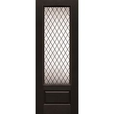 the front door is black and has a glass paneled design on it's side