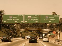 cars are driving down the freeway in los angeles