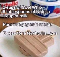 two cups of cool whip 6 tablespoos of nutella 1 cup of milk pour into popsicle molds freeze for a few hours