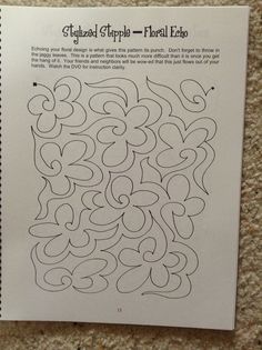 a piece of paper that has some type of pattern on it, and the text is written