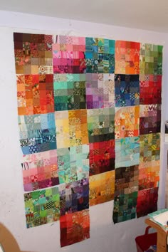 the wall is made up of many different colored squares