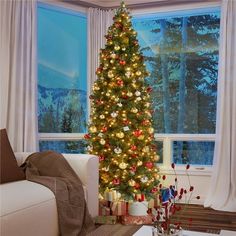 a living room with a christmas tree in the corner