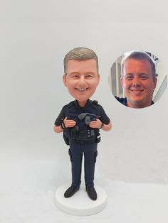 a police officer bobble head is shown next to an image of a smiling man