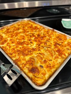 a casserole dish sitting on top of an oven