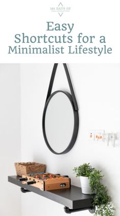 a shelf with a mirror and plant on it