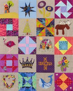 a quilt with many different designs on it