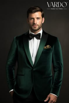 a man in a green suit and bow tie