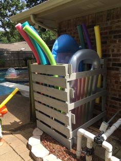 an outdoor pool with toys in it