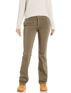 PRICES MAY VARY. Midrise; boot cut leg Hook and-eye closure provides a smooth clean front Flex tummy panel to slim silhouette Bi-stretch fabric for 360-degree movement Rinsed for softness Mid-rise Work Pants For Fall, Fitted Mid-rise Work Pants, Womens Dickies, Khaki Uniform Pants, Basic Wardrobe Pieces, Dickies Women, Bootcut Pants, Twill Pants, Tall Girl