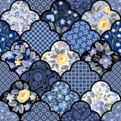 a blue and white pattern with flowers on it