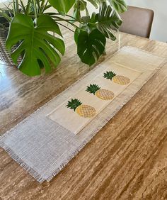 a table runner with pineapples on it