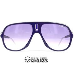 "Details: -Color: Purple colored frame / Purple gradient lens by Carrera -Lenses: 100% UV protection Lenses. -Size: Large / Frame width 139 mm / Frame height 49 mm / Temple length 135 mm -Item-No. Carrera SAFARI Info/description: -Carrera Sunglasses is currently one of the most popular sunglasses brand in the world. -The renowned tear drop shape lenses are dynamically combined with piped colour detail to the front to bring a real sporty but yet vintage vibe. -Thick metal sides feature Carrera branding for a real statement effect, while branding is also cleverly inlaid in silicone to the nose bridge. -Cut-out detail to the lenses for a high quality designer finish. -You will love these aviator style Carrera sunglasses that really embrace the style of the 80's. -NOS new old stock! LIMITED ED Vintage Aviator Sunglasses For The Beach, Vintage Mirrored Sunglasses For Streetwear, Vintage Polarized Sunglasses For Streetwear, Vintage Sunglasses With Tinted Lenses For Streetwear, Vintage Tinted Sunglasses For Streetwear, Vintage Shield Sunglasses With Uv Protection For Outdoor, Retro Purple Sunglasses With Mirrored Lenses, Vintage Shield Sunglasses With Uva Protection For Outdoor, Retro Purple Sunglasses With Tinted Lenses