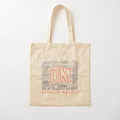 a tote bag with the word dm on it