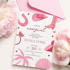 a pink and white wedding card with flamingos on it