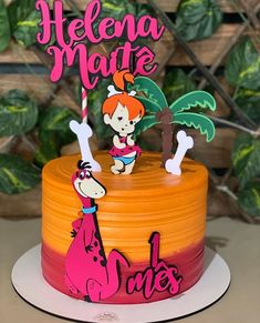 a birthday cake decorated with cartoon characters