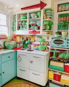 a kitchen filled with lots of colorful dishes