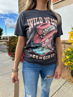 Our Wild West Cowgirls Graphic Top is perfect for your inner cowgirl! This western graphic t-shirt features sassy cowgirl boots and cowgirl hat, sure to give you the western flair you've been dreaming of! Yee-haw! Color: Dark Gray Fabric: 100% Cotton Made: El Salvador Includes: x1 T-Shirt Sizes: S-XL, Regular Sizing Cowgirl Hat, Yee Haw, Cowgirl Hats, Graphic Top, Gray Fabric, Cowgirl Boots, Grey Fabric, Wild West, Dark Gray