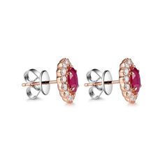 For Sale on 1stDibs - Introducing our Ruby Diamond Stud Earrings, exquisitely crafted in the romantic tones of 18K Rose Gold. These earrings feature the regal presence of rubies, Luxury Ruby Earrings With Halo Design, Luxury Diamond Earrings With Prong Setting, Luxury Ruby Earrings With Prong Setting, Elegant Red Cluster Earrings With Prong Setting, Elegant Ruby Earrings With Halo Setting, Elegant Ruby Earrings With Brilliant Cut, Formal Rose Gold Ruby Earrings, Elegant Red Earrings With Rose Cut Diamonds, Elegant Ruby Earrings With Rose Cut Diamonds