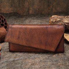 Overview： Design: Brown Womens Vintage Leather Long Wallet Geometry Clutch Long Wallet for LadiesIn Stock: 3-5 Days Made to OrderInclude: A WalletCustom: NoColor: Brown, Green, Red, Coffee, GreyMaterial: CowhideMeasures: 19cm x 2.5cm x 10cmWeight: 0.35kgSlots: 3 full bill slots, 12 card slotsStyle: Brown Womens Vintage Leather Long Wallet Geometry Clutch Long Wallet for LadiesNote： Each item will have very slight variances to the pictured wallet, and the consequence is that you can assure that e Wallet Vintage, Leather Long Wallet, Handmade Clutch, Wallets For Women Leather, Travel Work, Genuine Leather Wallets, Everyday Accessories, Card Holder Wallet, Long Wallet