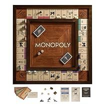 the monopoly board game is shown with its contents